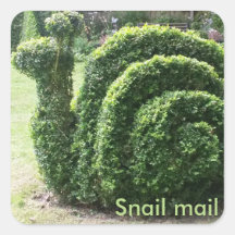 Snail mail. Fun topiary garden clipped green bush