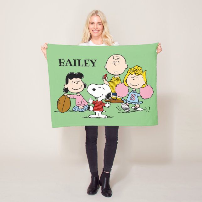 Snoopy and the Gang Play Football Fleece Blanket (In Situ)