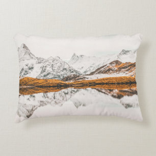 SNOW-CAPPED ROCKY MOUNTAIN UNDER CLOUDY SKY DURING ACCENT PILLOW
