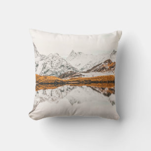 SNOW-CAPPED ROCKY MOUNTAIN UNDER CLOUDY SKY DURING THROW PILLOW
