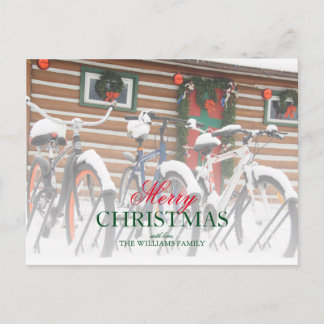 Snow-Covered Bicycles Near Festive Lodge Holiday Postcard