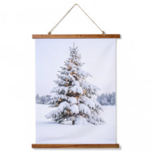 Snow-covered Christmas tree in winter landscape