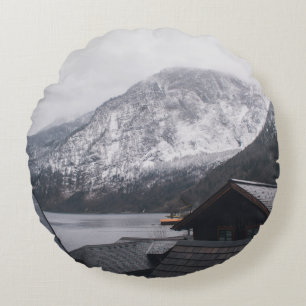 SNOW-COVERED MOUNTAIN NEAR BODY OF WATER ROUND PILLOW