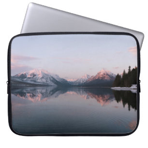 SNOW COVERED MOUNTAIN NEAR LAKE DURING DAYTIME LAPTOP SLEEVE