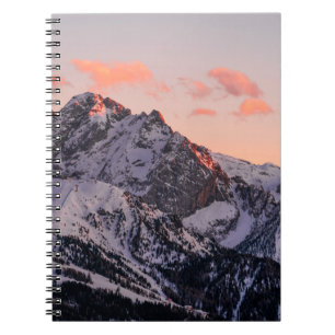 SNOW COVERED MOUNTAIN UNDER CLOUDY SKY DURING DAYT NOTEBOOK