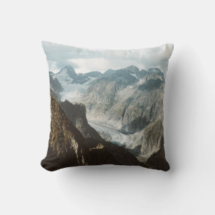 SNOW COVERED MOUNTAINS DURING DAYTIME THROW PILLOW