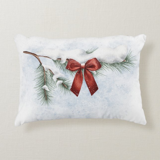 snow-covered pine branch with a festive red bow accent pillow (Front)