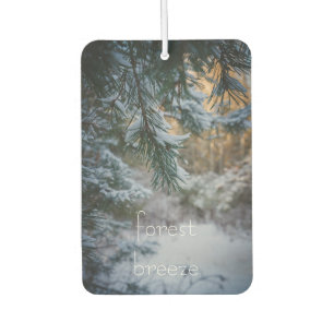 Snow-covered pine branches air freshener