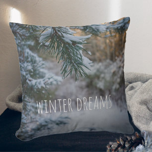 Snow-covered pine branches throw pillow