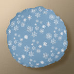 Snow Day Round Pillow<br><div class="desc">This fluffy round throw pillow has two looks--little white snowflakes on a foggy-day blue background on one side,  and a scattering of bigger flakes on a deep evening blue background on the other.  Perfect for snuggling up by a cozy fireplace day or night.</div>