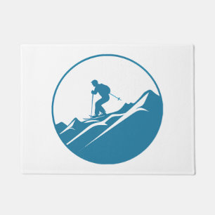 Snow Skier Skiing Down Rocky Mountains Blue and Wh Doormat