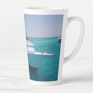 Snow-white yacht near the White Island in Red Sea Latte Mug