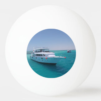 Snow-white yacht near the White Island in Red Sea Ping Pong Ball