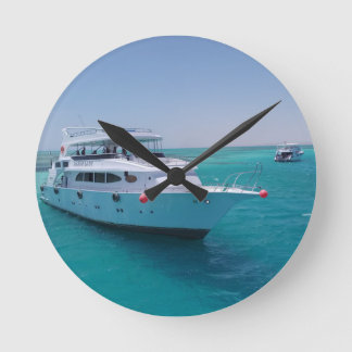 Snow-white yacht  near the White Island in Red Sea Round Clock