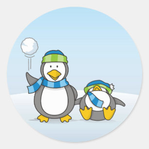 Snowballing penguins classic round sticker