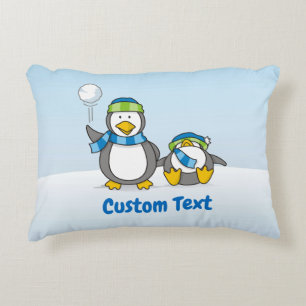 Snowballing penguins decorative pillow