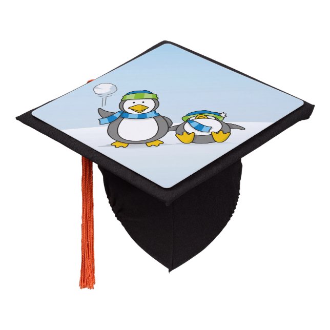 Snowballing penguins graduation cap topper (Angled)