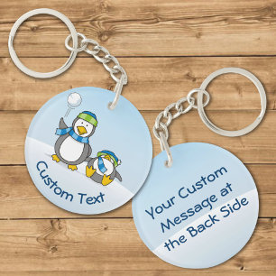 Snowballing Penguins Keychain