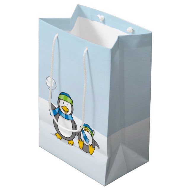 Snowballing penguins medium gift bag (Front Angled)