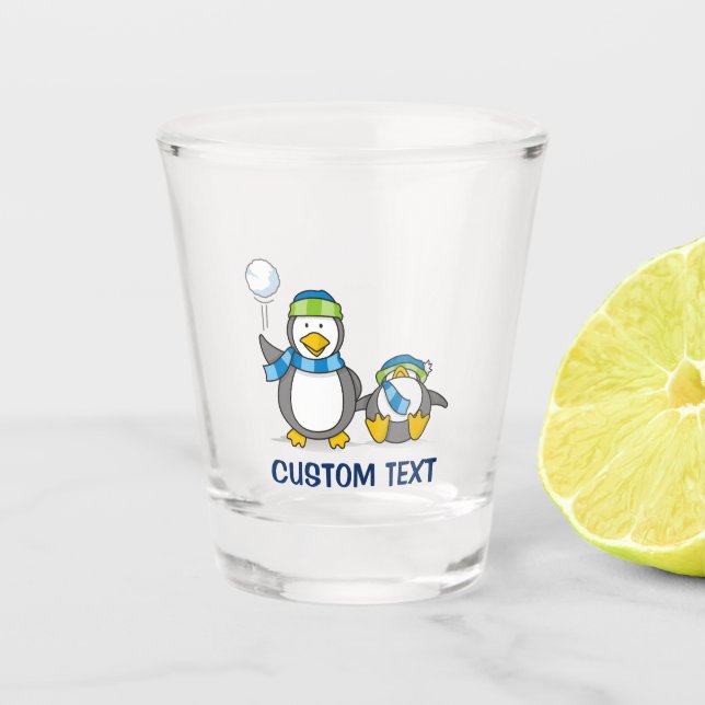 Snowballing penguins shot glass (Front)