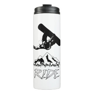Snowboarder grabs during stunt going down mountain thermal tumbler