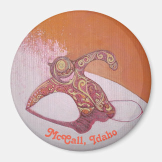 Snowboarder shredding some pow magnet