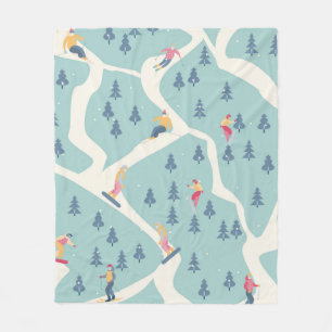 Snowboarders and skiers ride in the ski resort. Pe Fleece Blanket