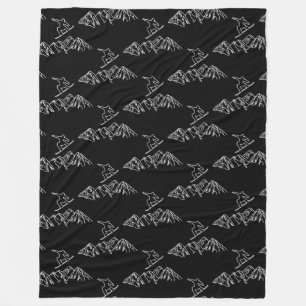 Snowboarders in the mountains fleece blanket