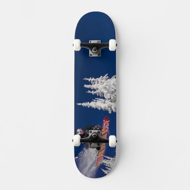 Snowboarding action at Whitefish Mountain Resort Skateboard (Front)