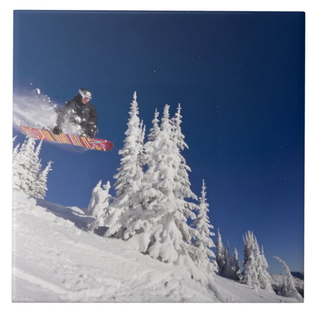 Snowboarding action at Whitefish Mountain Resort Tile (Front)