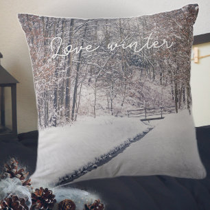 Snowfall at the park throw pillow