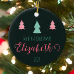 Snowfall Wishes - Personalized Baby's First Christ Ceramic Ornament<br><div class="desc">Celebrate the magic of your baby's first Christmas with our personalized 'Snowfall Wishes' ornament! Adorned with elegant snowflakes and featuring the sweet message 'My First Christmas, ' this ornament is a timeless keepsake for your little one. Customize it with your baby's name—like Elizabeth—for a personal touch. The front showcases two...</div>