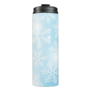 Snowflakes and lights on blue thermal tumbler