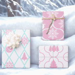 Snowflakes and Snowmen Wrapping Paper Sheet<br><div class="desc">Icons of Christmas in pink and white; snowflakes,  snowmen and Christmas trees.</div>