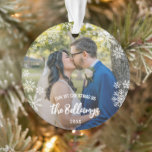 Snowflakes First Christmas As Married Last Name Ornament<br><div class="desc">Snowflake themed first Christmas as married ornament with your last name in a charming brush script, personalized with your wedding photos. First Christmas as married ornament for newly weds personalized with one photo on either side, your last name in a white brush script overlay along with lots of pretty snowflakes....</div>
