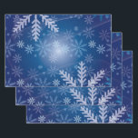 Snowflakes in Blue Wrapping Paper Sheet<br><div class="desc">Set of three 19” x 29” semi-gloss sheets of wrapping paper with an image of snowflakes on dark blue. See matching greeting card,  label,  confetti and square sticker. See the entire Hanukkah Wrapping Paper collection under the HOME category in the HOLIDAYS section.</div>