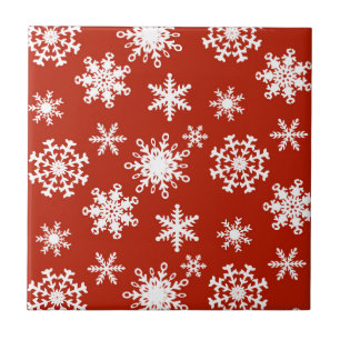 Snowflakes in white on red background tile