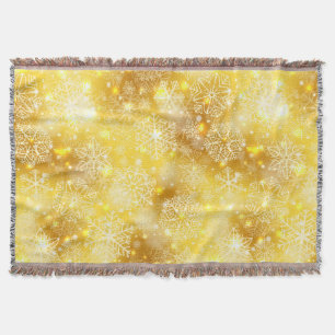 Snowflakes on golden throw blanket