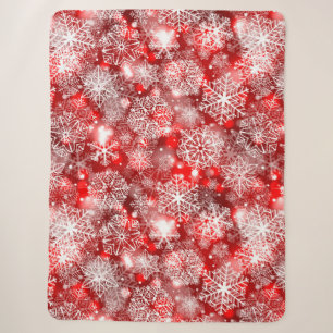 Snowflakes on red sherpa blanket