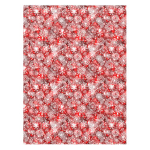 Snowflakes on red tablecloth