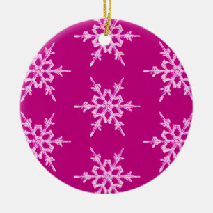 Snowflakes, pale pink crystals on magenta ceramic ornament
