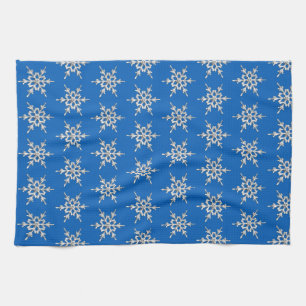 Snowflakes, silver crystals on cobalt blue kitchen towel