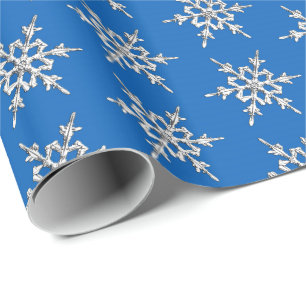 Snowflakes, silver crystals on cobalt blue wrapping paper