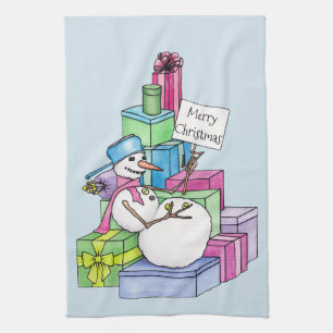 Snowman chilling on presents kitchen towel