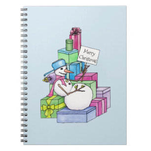 Snowman chilling on presents notebook