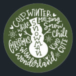 Snowman Christmas Winter Wonderland typography Classic Round Sticker<br><div class="desc">A festive typography composition of handwritten Christmas quote (Snow Chill, Jingle Bells, Cold Winter , White Christmas, Wonderland, Christmas Wish) encircles a doodle snowman with little hearts and snowflakes. Perfect to seal you Christmas and Holidays letters and Holiday cards or to adorn your Presents under the Christmas tree! Forest Green...</div>