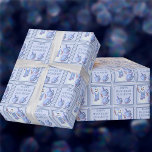 Snowman Dreidels Cute Childs Name Happy Hanukkah Wrapping Paper<br><div class="desc">This cute snowman and dreidels Happy Hanukkah gift wrap is ready for you to personalize it and make it your own. The geometric squares pattern is filled with the adorable Jewish snowman flanked by his soft blue and purple dreidels along with a text template where you can add a name...</div>