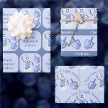 Snowman Dreidels Cute Happy Hanukkah Kids Name Wrapping Paper Sheet<br><div class="desc">Create your own Happy Hanukkah wrapping paper assortment and personalize it by adding your child's name into each of three designs. Set on a background of pale pastel blue, this cute Hanukkah gift wrap features a happy Jewish snowman and his matching set of dreidels in soft blues with a touch...</div>