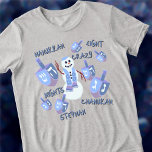 Snowman Dreidels Funny 8 Crazy Nights Hanukkah<br><div class="desc">Personalize this funny Hanukkah T-Shirt as a cute gift or maybe for yourself! A happy Jewish snowman waves hello in the centre of the design with seven matching blue and purple dreidels of varying sizes dance around him. Sprinkled in among the dreidels are words in a dark blue whimsical handwritten...</div>