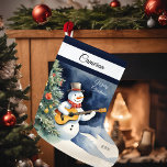 Snowman Guitar Personalized Large Christmas Stocking<br><div class="desc">Bring holiday cheer to your home with our Snowman Guitar Large Christmas Stocking! Ideal for gifts and goodies, it’s a delightful addition to your festivities. Personalize with that special name and year for a wonderful keepsake! Exclusive designs created just for you from My Baby Boutique!</div>